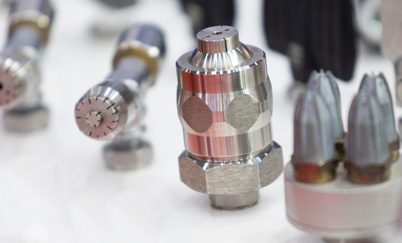 nozzle spare parts using for machine maintenance ; close up ; engineering equipment background