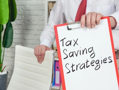 Man holding clipboard with Tax savings strategies, tax-free income, retirement income