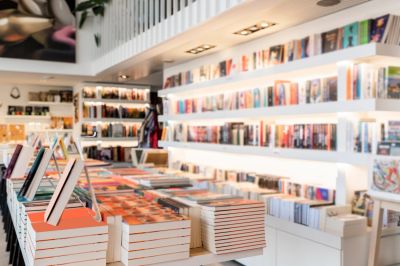 Well-lit bookstore with neatly arranged books.