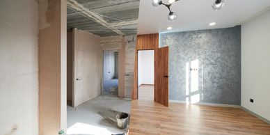 Half-renovated room with unfinished and finished sides.