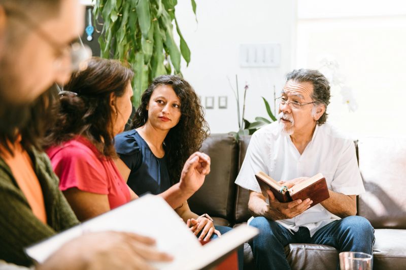Book club group discussing a lecture