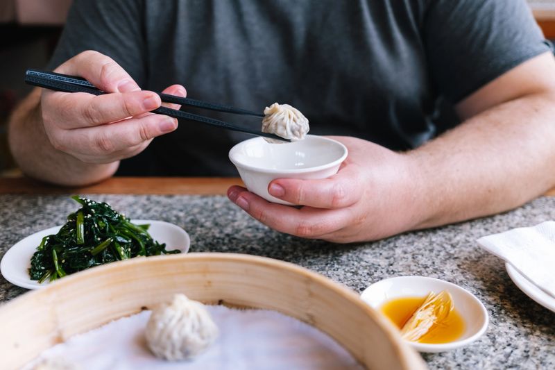 Asian lunch: delicious vegetarian steamed buns served in a restaurant.