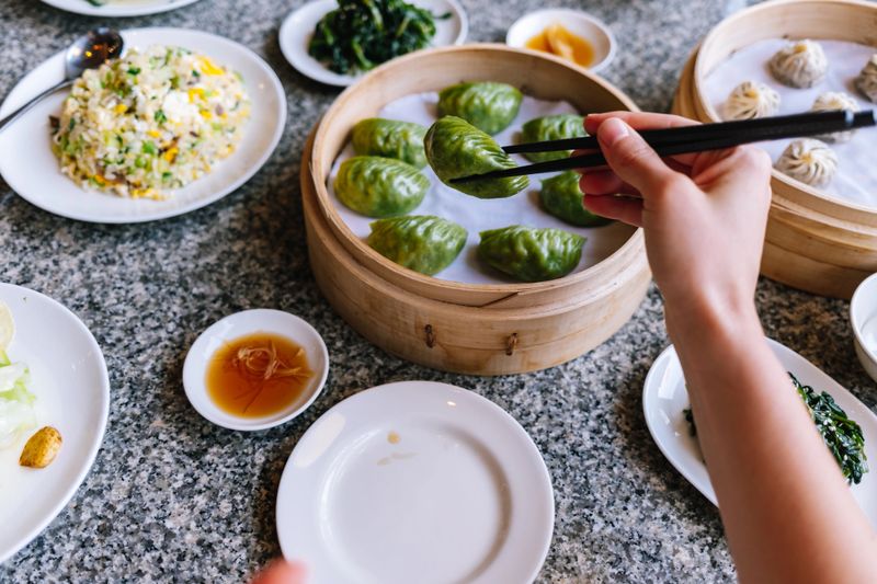 Delicious vegetarian steamed dumplings in an Asian restaurant, a close up.