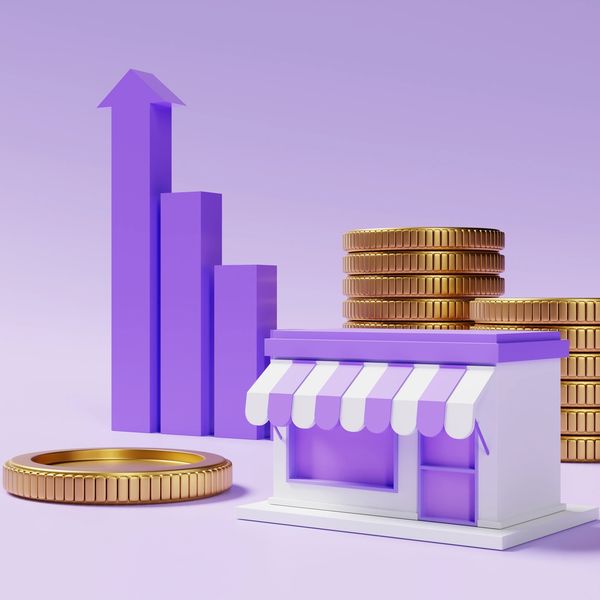 3D model of a small store with a rising bar graph and stacks of coins.