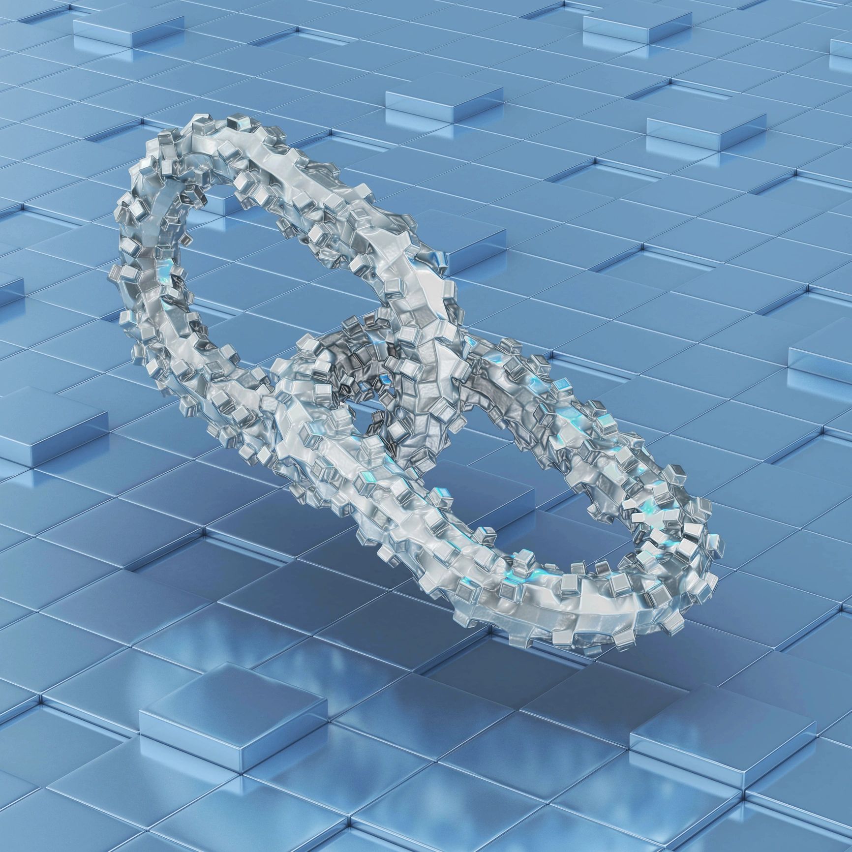 Two interlocked futuristic rings with a crystalline texture on a blue tiled surface.