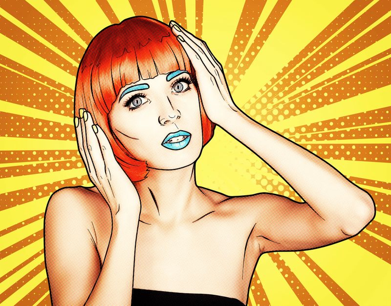 Portrait of young woman in comic pop art make-up style. Female in red wig on yellow - orange cartoon background.