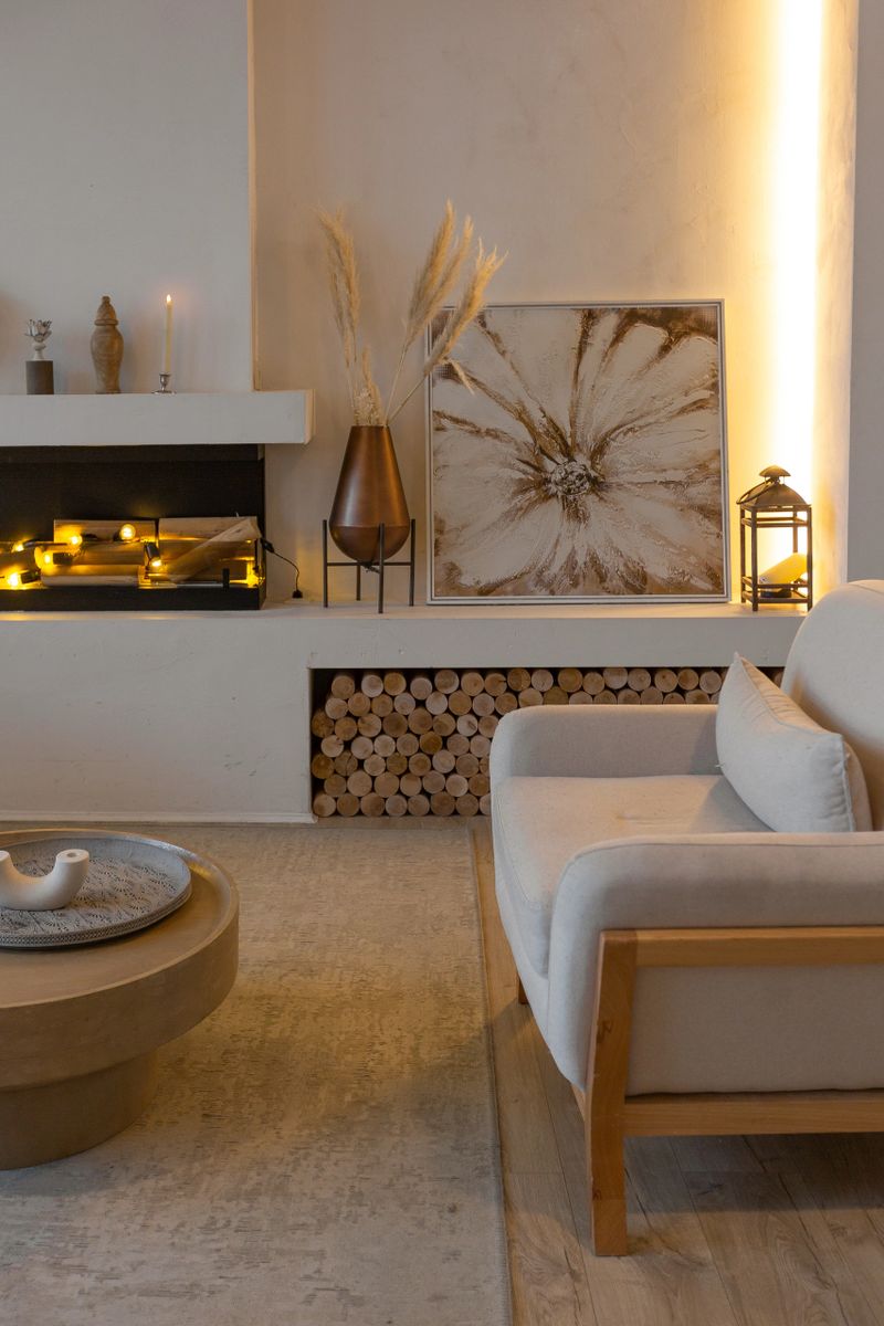 cozy warm home interior of a chic country house with an open plan, wood finishes, warm colors and a family hearth. view of the recreation area for family and guests