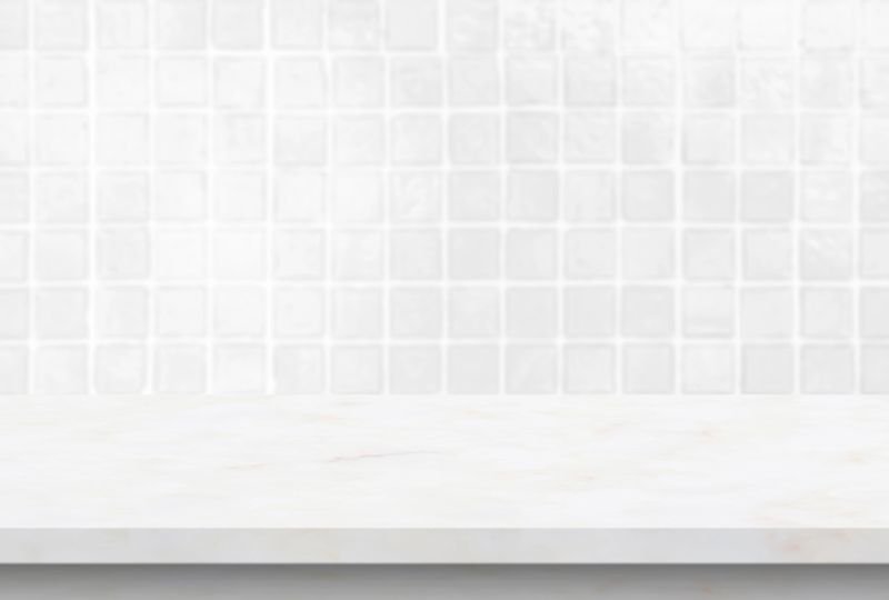 Empty white marble table top with blur tile wall bathroom background