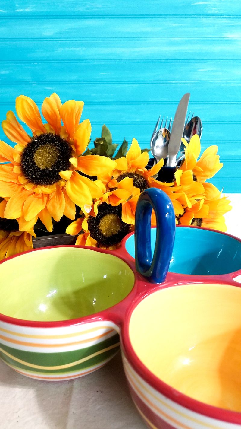 Festive colorful dishes with turquoise background.