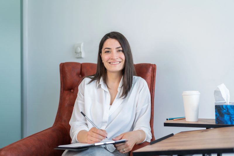 Portrait Of Female Psychologist In Office