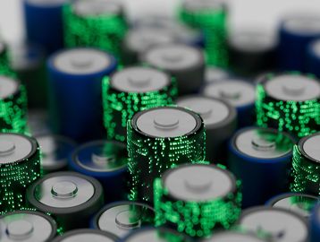 Batteries with green digital circuit patterns.