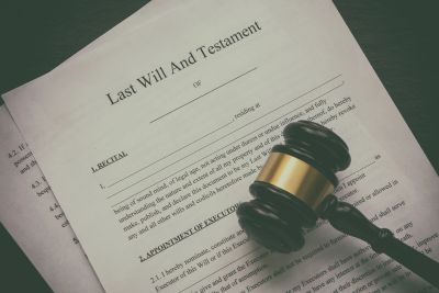A last will and testament document with a judge's gavel.