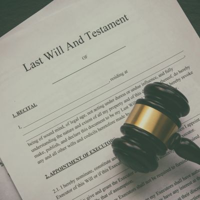 Last Will and Testament document with a judge's gavel.