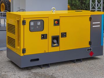 Yellow industrial generator unit.