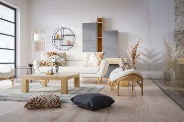 Modern living room with neutral tones and minimalist furniture.