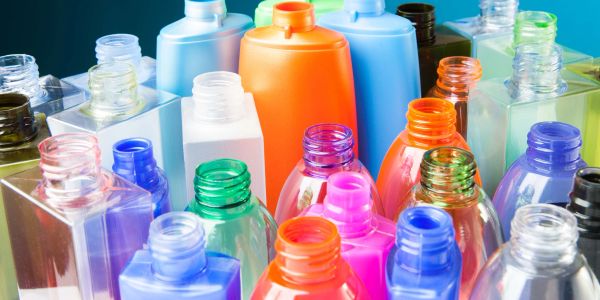Colorful empty plastic bottles grouped together.