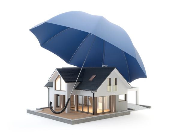 A house under an umbrella displaying that the precious belongings inside are well protected. 