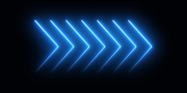 Glowing blue arrows pointing right on black background.