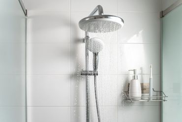 Modern bathroom shower with rainfall shower head.