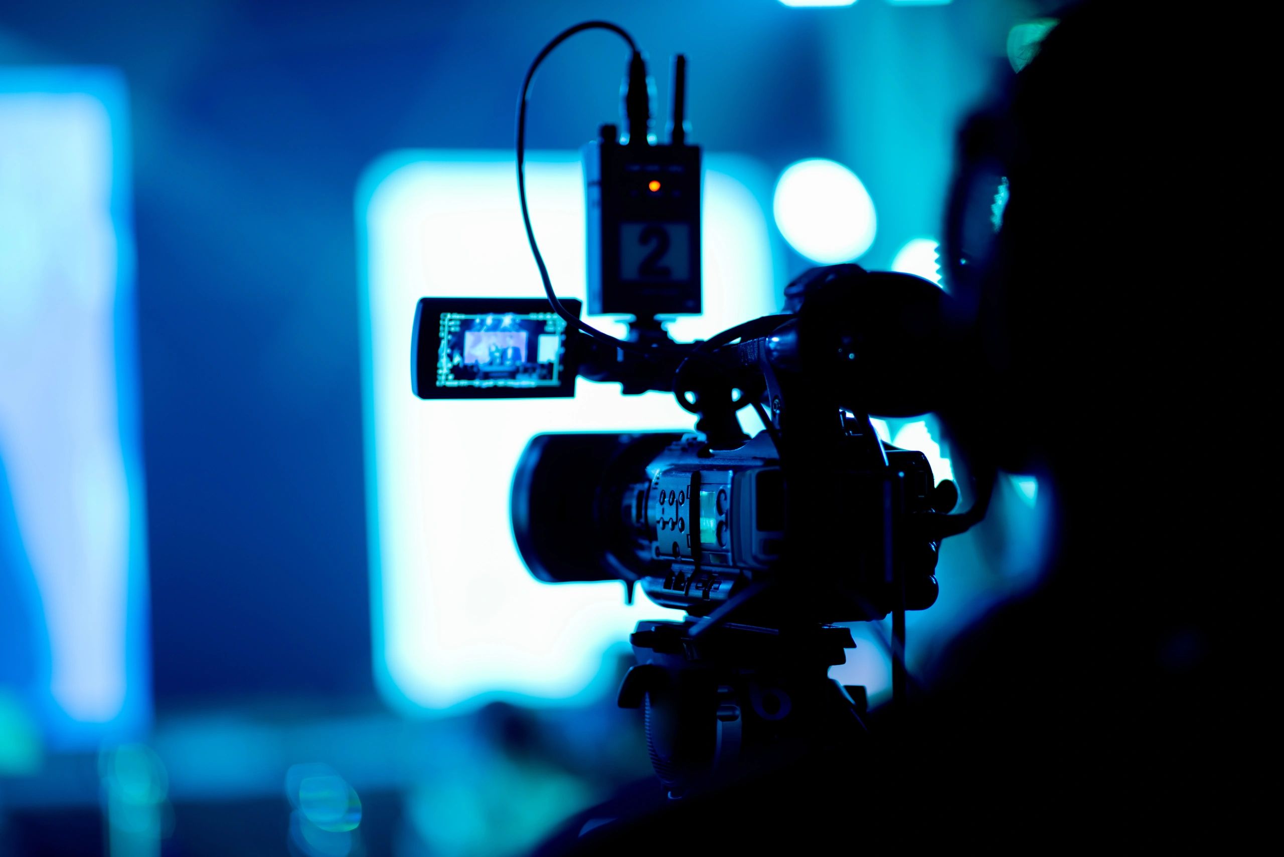 Cinematographer behind the camera.