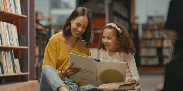 Parent reading to child. Make America safe. National security. Safe school.