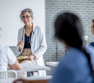 Confident educator leading in classroom