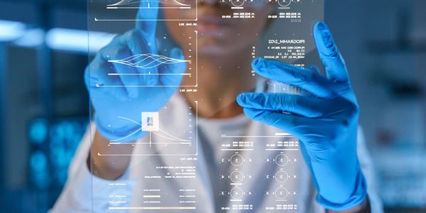 Scientist interacting with futuristic digital data display in a lab.