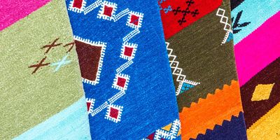 Colorful woven textiles with geometric patterns.