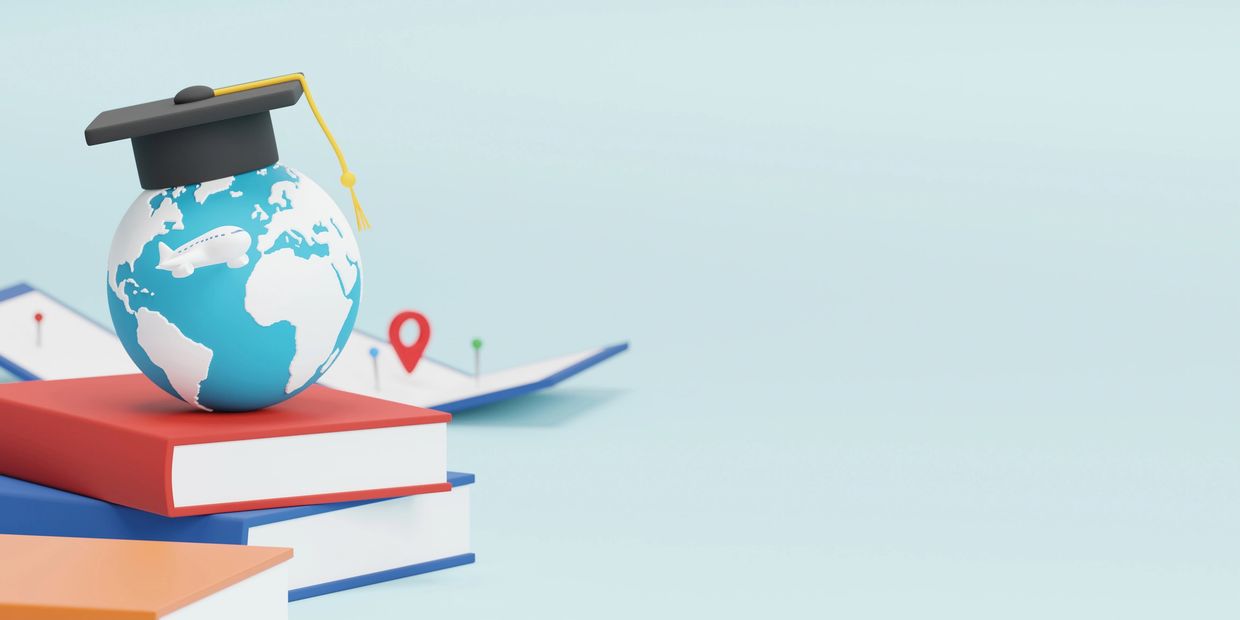 Globe with graduation cap on books, airplane and map pins symbolizing global education and travel.