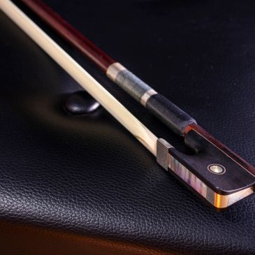 A selection of finely crafted violin bows