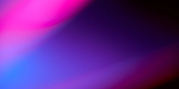 Abstract gradient with vibrant pink, blue, and purple hues blending smoothly. Perfect lighting for any event space, wedding venue, or party venue.