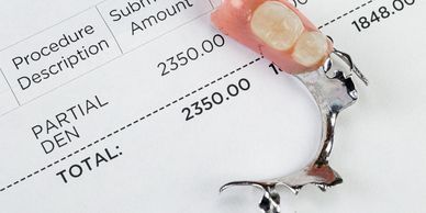 Partial denture on a dental bill showing a cost of $2350.
