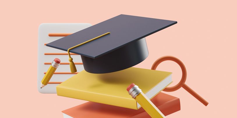 Graduation cap, books, pencils, and magnifying glass symbolizing education and learning.