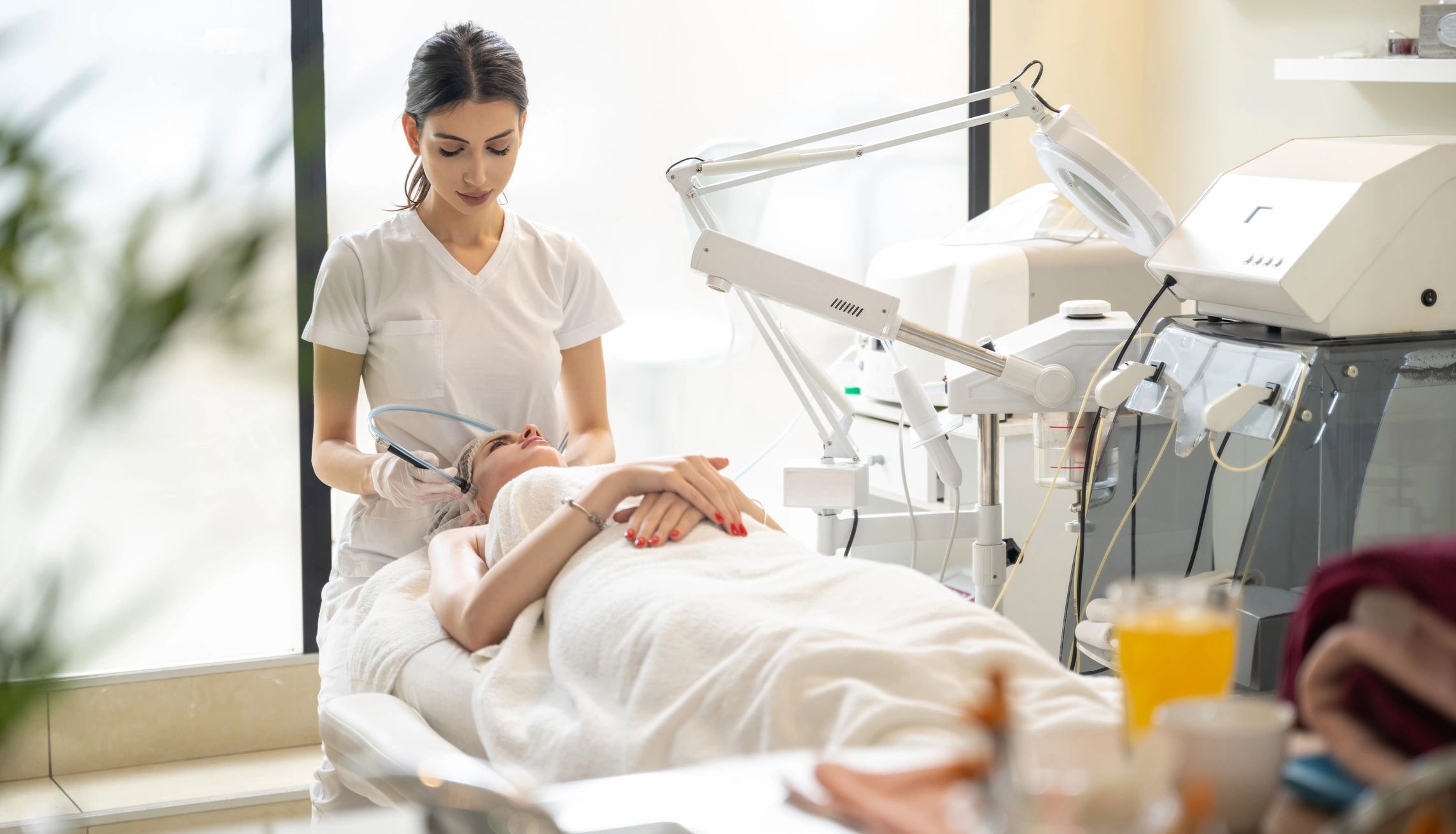 Clean, professional medical spa treatment room with neutral tones at Aesthetic Artistry Medical Spa in Fort Walton Beach