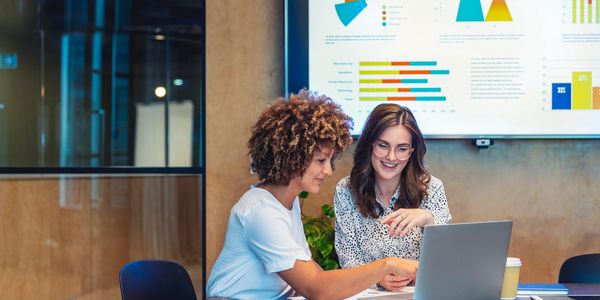 Consulting team discussing process improvement and change management.