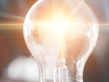 Close-up of a glowing light bulb.