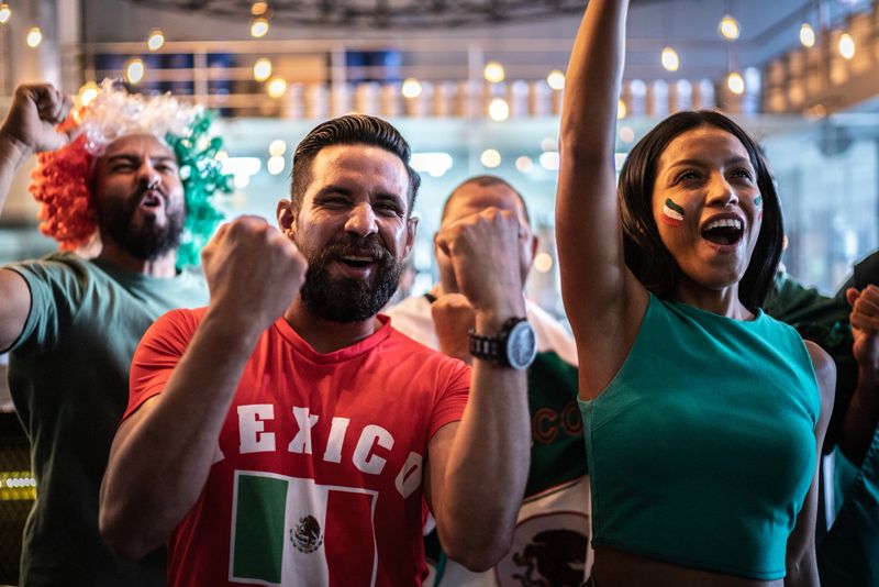 Mexican fans celebrating a goal in soccer game