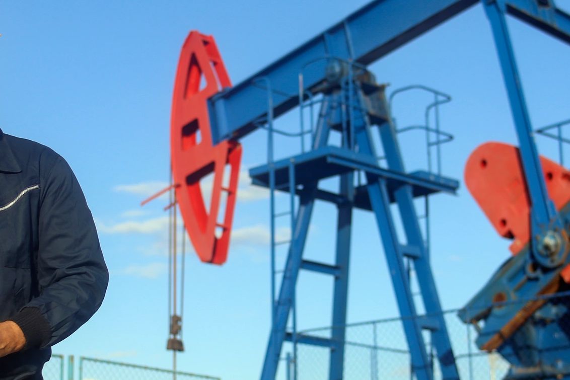 Oil pumpjack against clear sky.