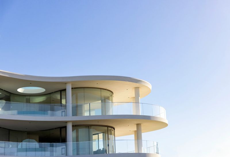 Closeup brand new modern apartment building, Sydney Australia, Cronulla NSW, Mitchell Road, sky background with copy space, full frame horizontal composition