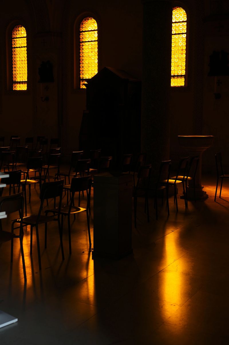 church illuminated by the light coming from the windows at dawn