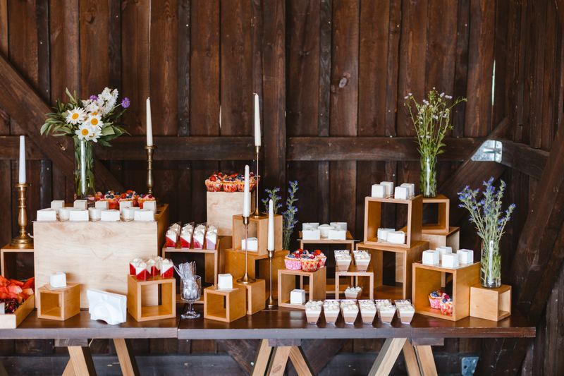 Candy bar. Festively decorated buffet table for guests. A stand with a variety of desserts for celebrating a party