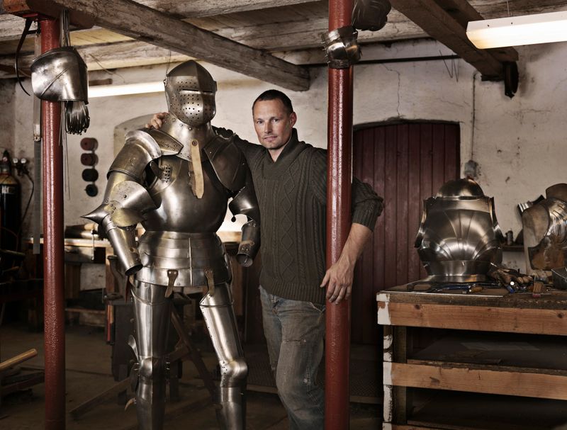 Blacksmith with armor in shop