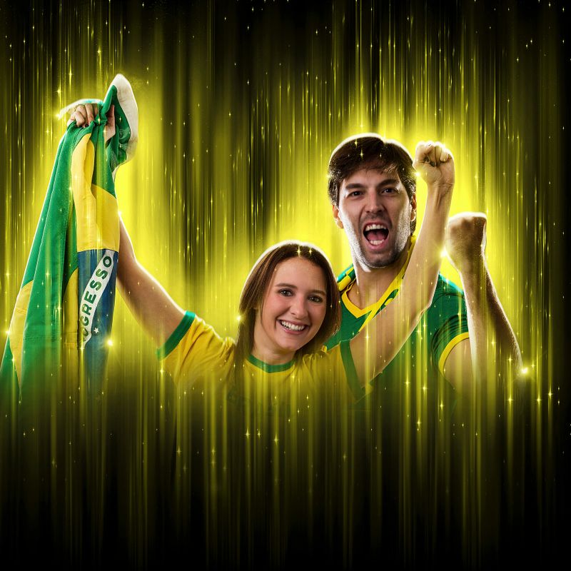 Brazilian couple Celebrating the cup on a black background with yellow glow, cheering for Brazil to be the champion.