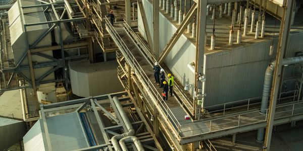 Construction site with safety gear and tools.