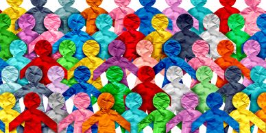 Colorful paper cutout people holding hands.