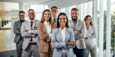 Confident business team posing in office.