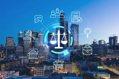 Legal and justice icons over a cityscape at dusk.