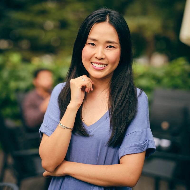 A portrait of a young adult looking at the camera.