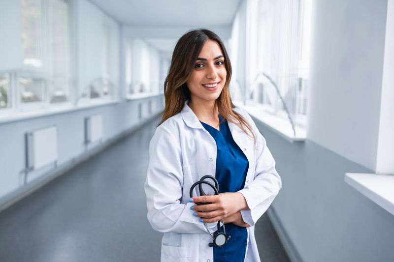 Portrait of a doctor's intern, in the university building.