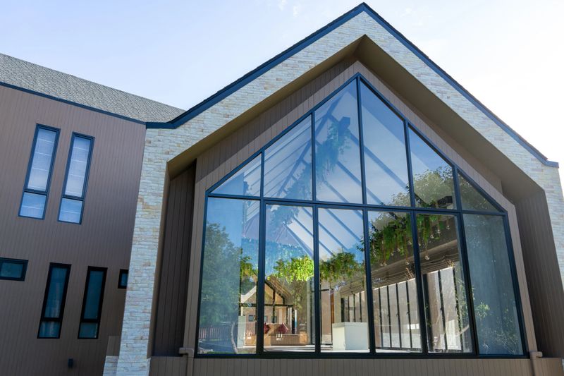 Barn House design house and cafe, large glass building with a triangular roof.